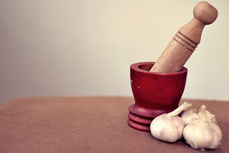 Ayurvedic preparations being mixed in a traditional workshop